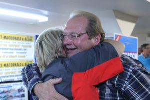 Steve Streatch gets a big hug from long time supporter and friend Krista Snow on Oct. 15. Streatch had the most votes overall in DIstrict 1 from students to win in StudentVote. (Healey photo)
