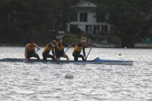 The team of Matt and Mike Sampson, Mason Koch, and Mark Wiseman paddle their way during the Canoe/Kayak nationals on Lake Banook last month. (Healey photo)