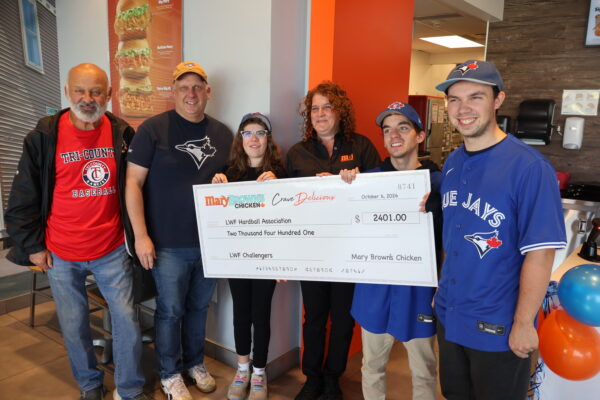 Chicken, community, and a big assist: $2,400 raised for LWF Challenger Baseball